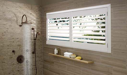 Palm Beach Polysatin Vinyl Shutters in bathroom